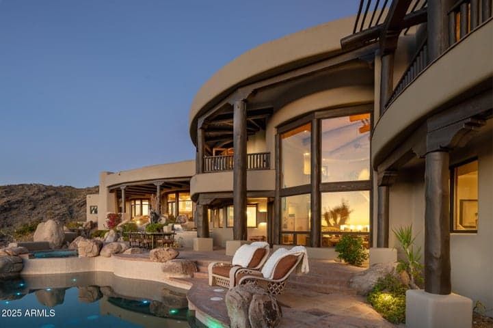Entertain effortlessly with 2,000 square feet of thoughtfully designed outdoor space. From poolside lounging to al fresco dining under the stars, this expansive terrace is the ultimate entertaining retreat—featuring custom seating areas, mature landscaping, and an inviting heated pool and spa.