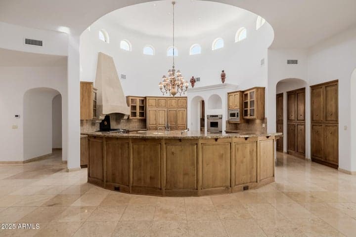 KITCHEN WITH 20' DOMED CEILING WITH AN ABUNDANCE OF NATURAL LIGHT