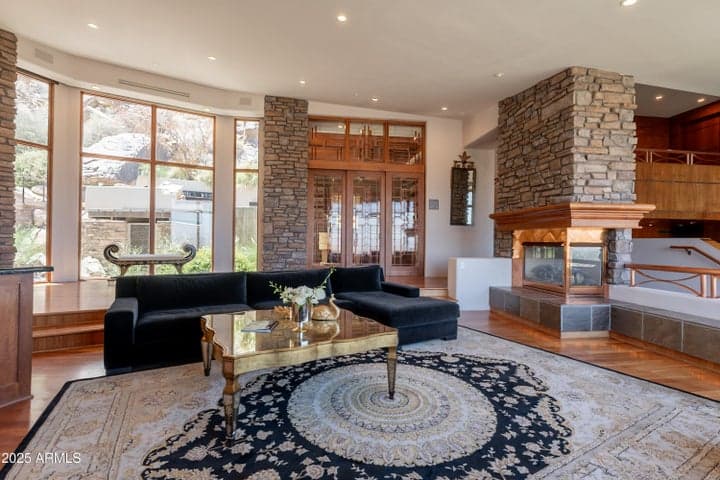 Rich warm wood, natural stone and copper create a timeless and modern aesthetic