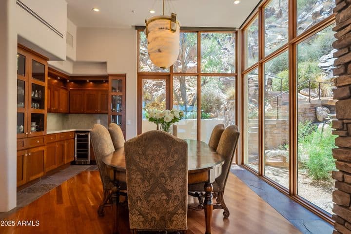 Custom built-in cabinetry and floor-to-ceiling windows