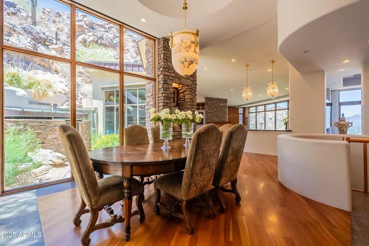 Rugged mountainside beauty and vast Valley vistas across the room to the east
