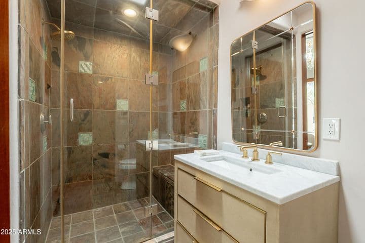 Walk-in shower and beautiful vanity