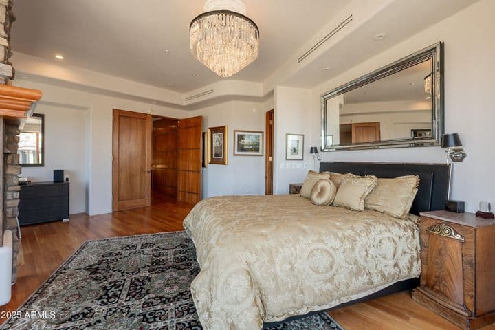 Beautiful chandelier and gleaming hardwood floors