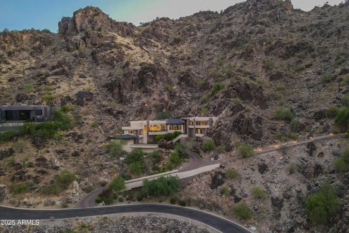 1.5 acre lot with home designed and built into the mountain