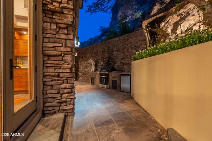 Evening entertaining spaces throughout the backyard