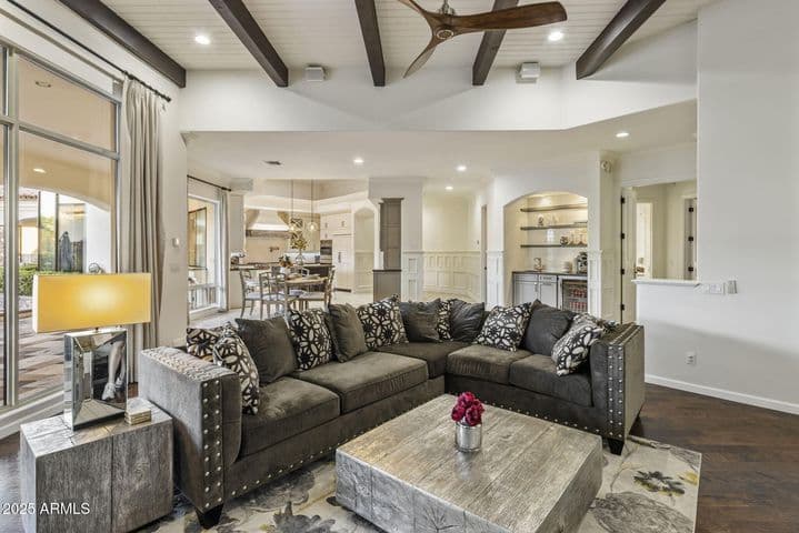 The family room nestled off the kitchen makes for wonderful entertainment