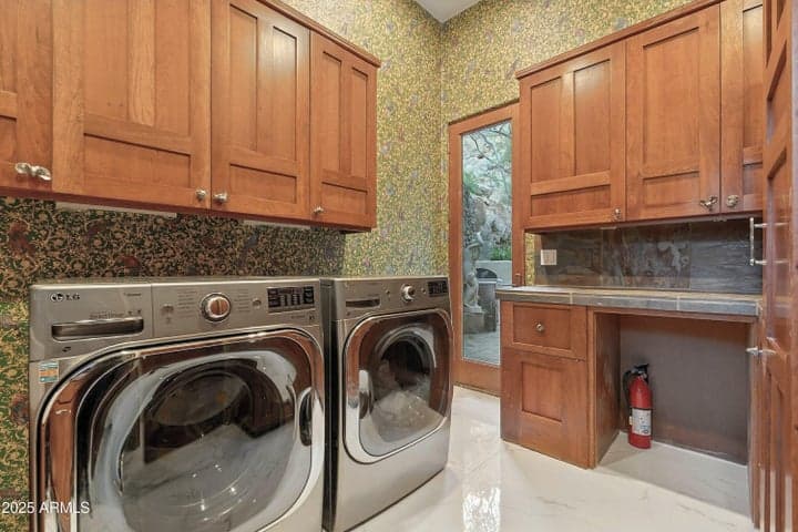 Stylish storage solutions and direct access to patio and built-in BBQ