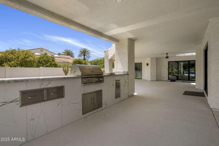 Large Quartz top outdoor BBQ accessible to the Kitchen
